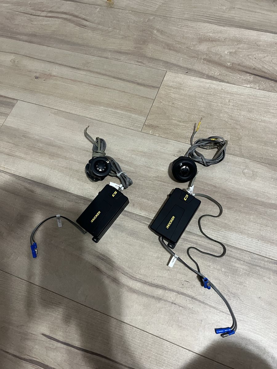 Compact Kicker car audio tweeters with integrated wiring.