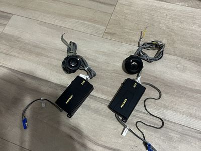 Compact Kicker car audio tweeters with integrated wiring.