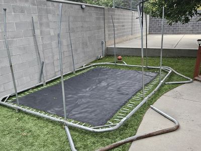 Used Rectangular Trampoline Frame, Mat, and Poles - Needs Assembly & Some parts