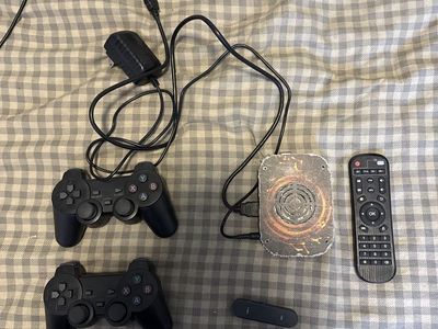 Retro Gaming Console with 2 Controllers, Remote, and SD Card - Play Classic Games!