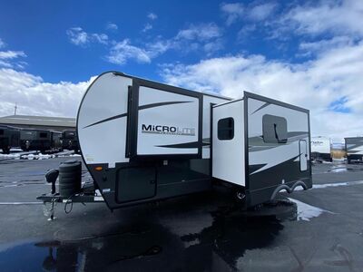 New 2025 Forest River RV Flagstaff Micro Lite Couples Travel Trailer w/Fireplace and 67" Theater Seats(25BSDS)