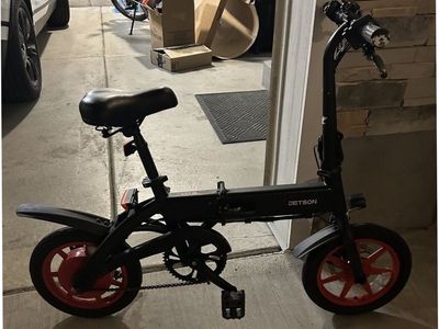 Jetson Folding Electric Bike - Compact, Portable, Black/Red Wheels