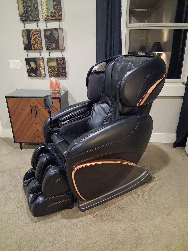 Cozzia black leather massage chair.