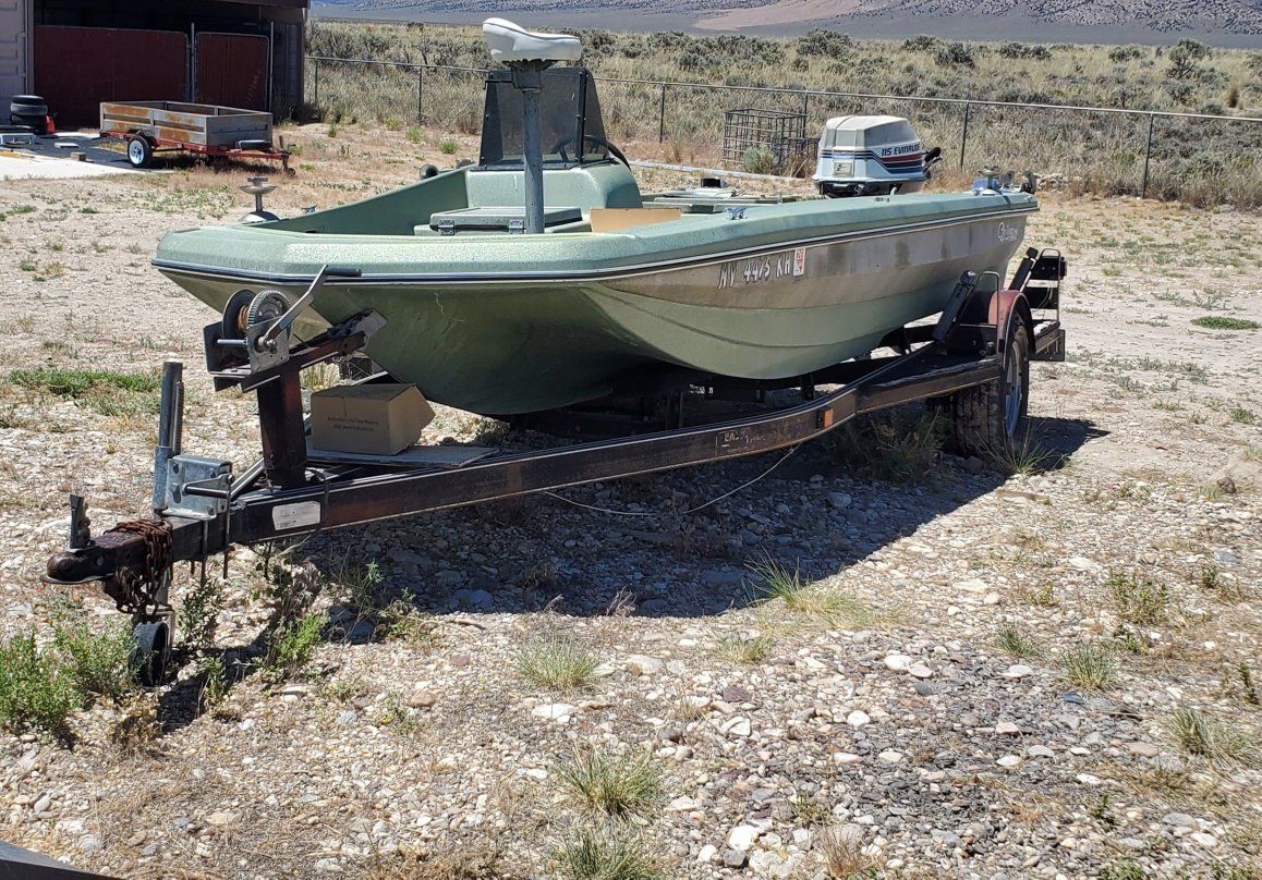 Bass Boat 1977 16' Challenger with 3-115hp Johnson outboard motors.