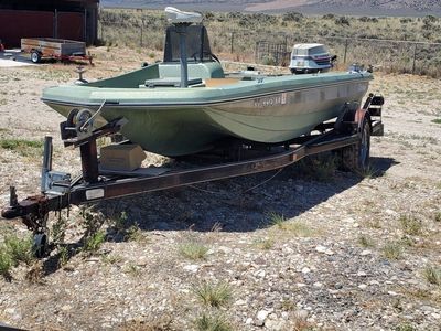 Bass Boat 1977 16' Challenger with 3-115hp Johnson outboard motors.