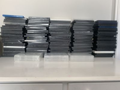 Lot of 202 USED EMPTY DVD CASES with varying STORAGE AMOUNT.. SEE DESCRIPTION for more details.