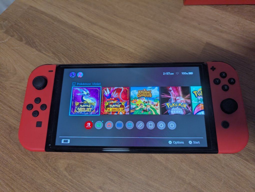 Nintendo Switch OLED Bundle + Gengar Hori Accessories + dbrand Prism 2.0 - Like New