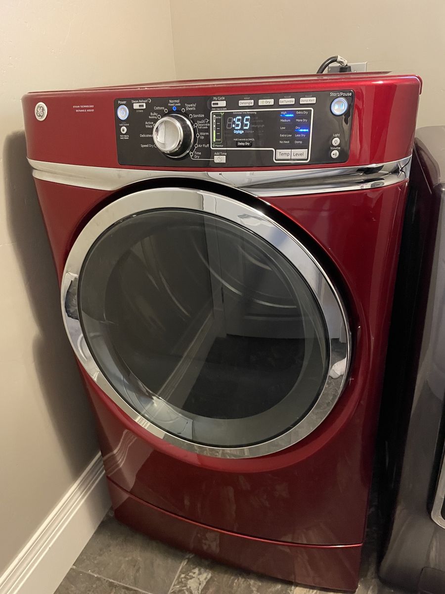 GE Ruby Red Electric Front-Load Dryer - RightHeight Pedestal Design