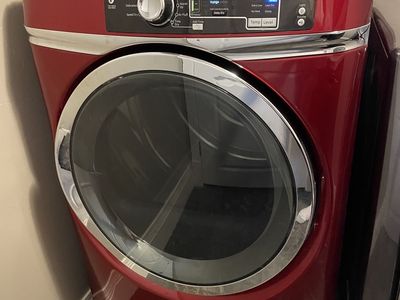 GE Ruby Red Electric Front-Load Dryer - RightHeight Pedestal Design