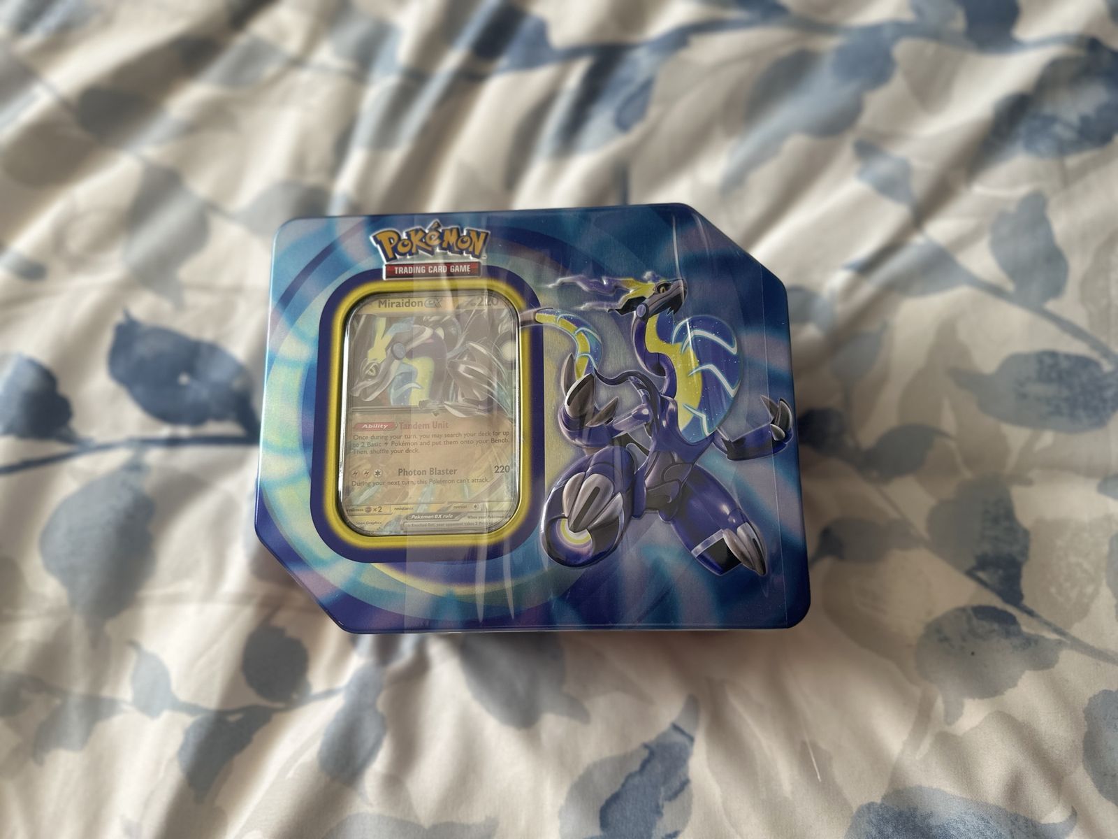 Pokémon Trading Card Game Mirraidon ex Tin - Transcend Past & Future with Pokémon ex!