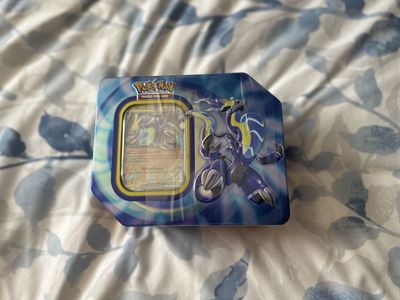 Pokémon Trading Card Game Mirraidon ex Tin - Transcend Past & Future with Pokémon ex!