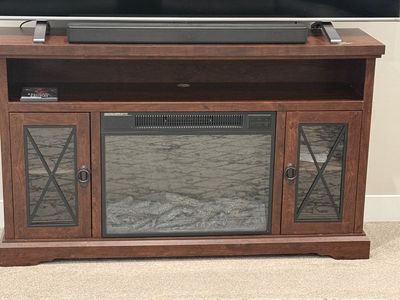 Entertainment center with fireplace