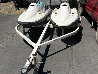 Two Arctic Cat Tigershark Wave Runners!