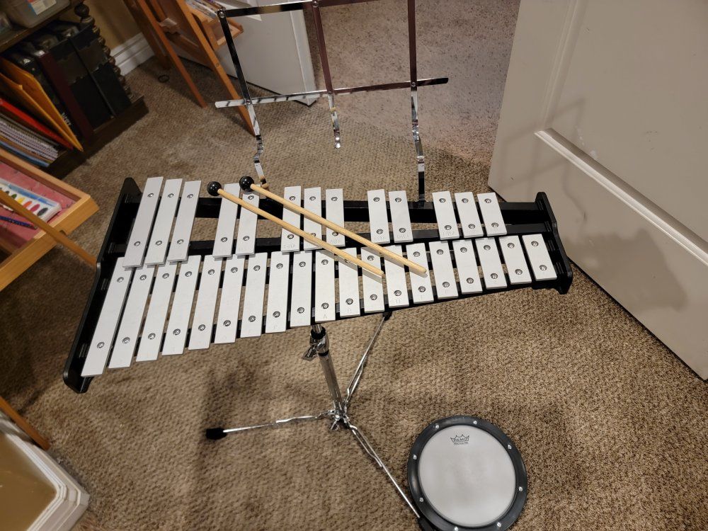 Pearl Student Percussion Kit with Glockenspiel, Practice Pad, Stand, and Backpack Case