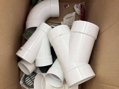 Assorted PVC Pipe Fittings and Drain Grates Lot