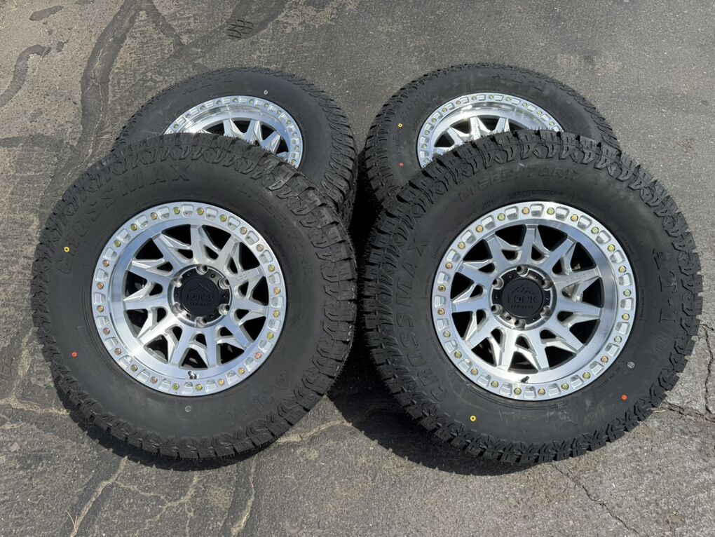 New Silver Lock 285/70r17 AT 6x5.5 Chevy Tacoma GM