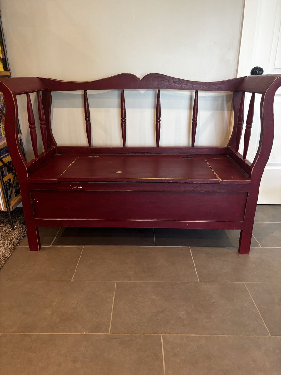 Red wooden bench