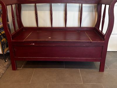 Red wooden bench