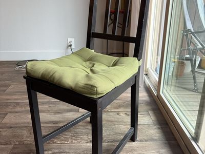 Set of four black chairs + seat covers