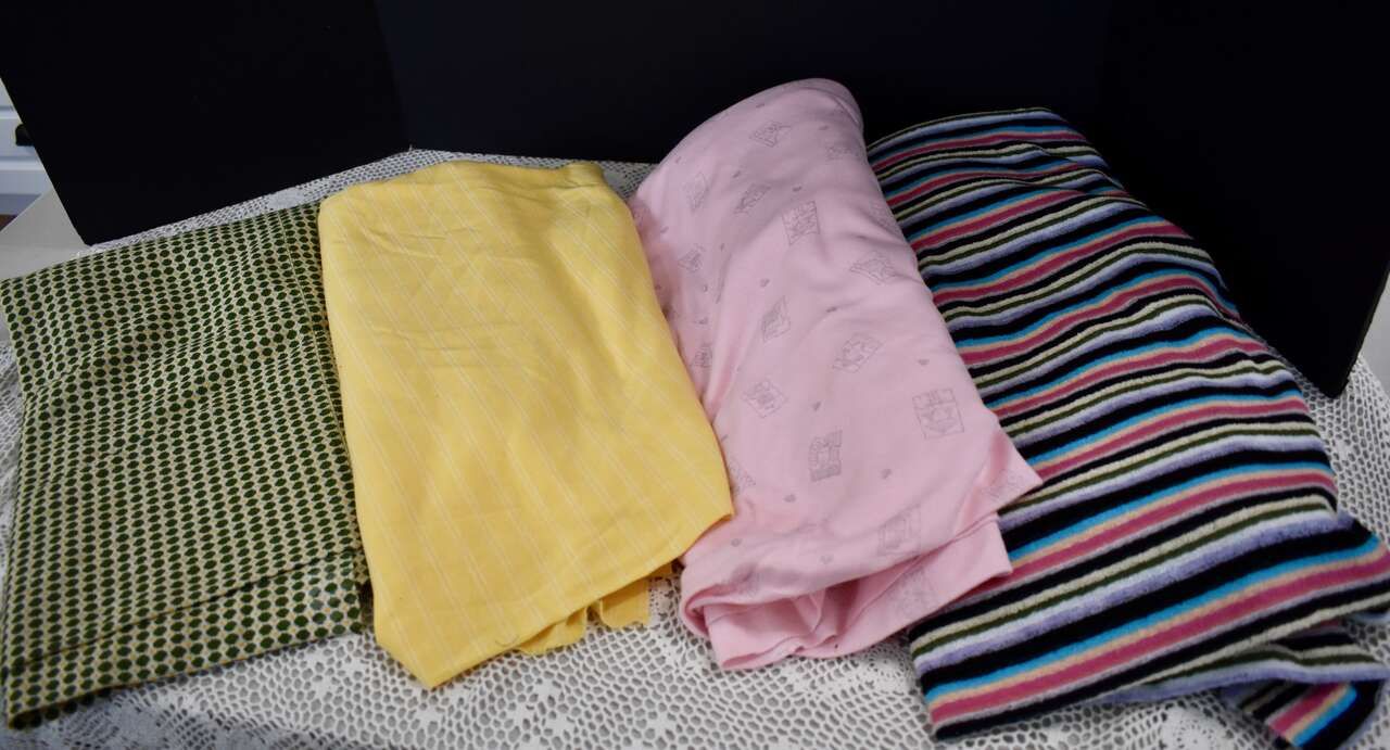 Several Yards Of Different Colors And Kinds Of Vintage Knit Type Fabrics For Making Clothes Or Fun Crafts With