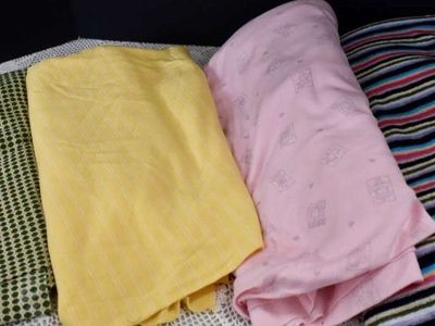 Several Yards Of Different Colors And Kinds Of Vintage Knit Type Fabrics For Making Clothes Or Fun Crafts With