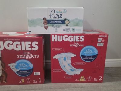 Huggies Little Snugglers Diapers Size 1 (160 ct) & Size 2 (144 ct), Pampers Pure Newborn (76 ct)