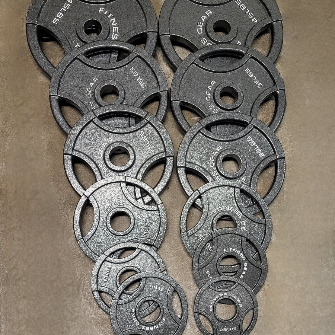 247 pounds of Olympic weights