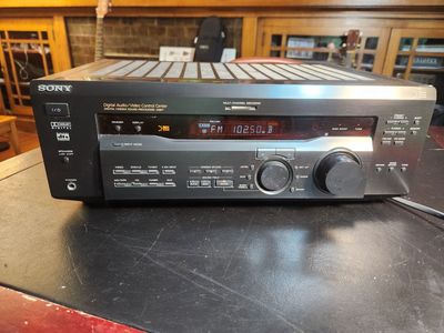 Sony receiver STR-DE445, 5.1 Surround Sound, 185 Watts, has digital optical audio port. Works great. Clean and loud.