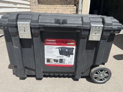 Husky 37 in. Rolling Tool Box Utility Cart with a 50-gallon capacity and a keyed lock system.