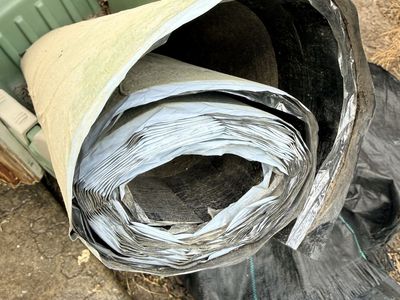 Roll of roofing material. Weather guard