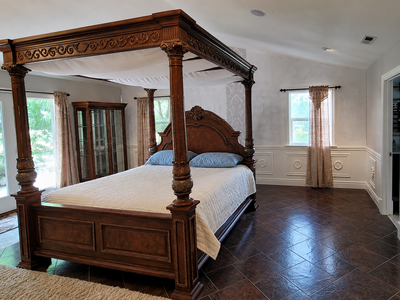 Ornate Wooden Four-Poster Canopy Bed Frame with Intricate Carved Detailing