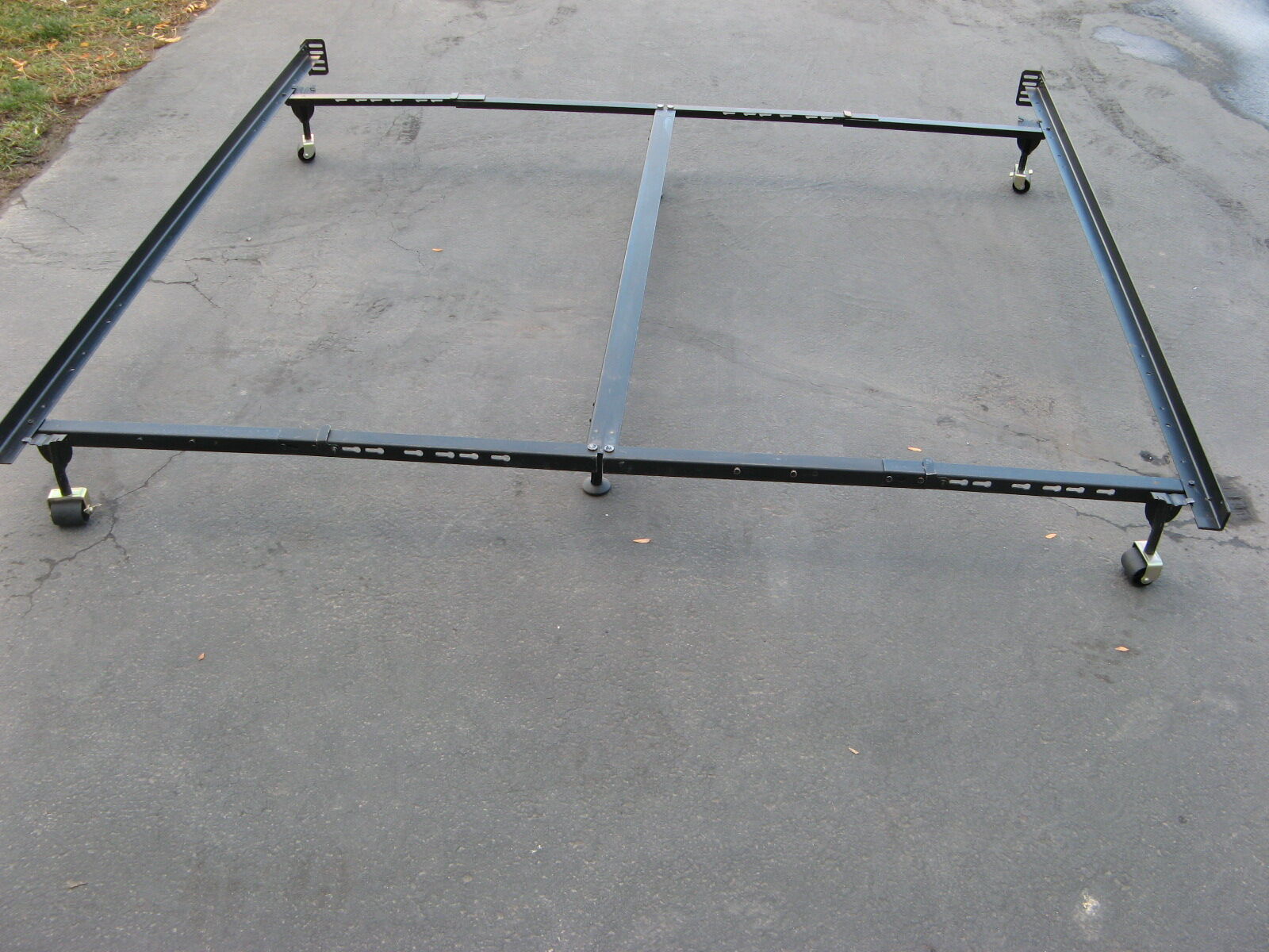 2 King Size Metal Bed Frames w/wheels Great Condition