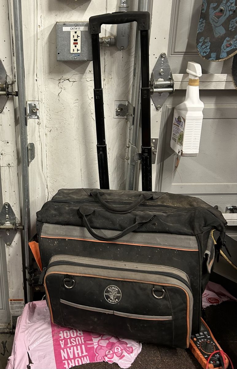 Used Klein Tools Rolling Tool Bag with Telescoping Handle and Klein meter with magnetic tether