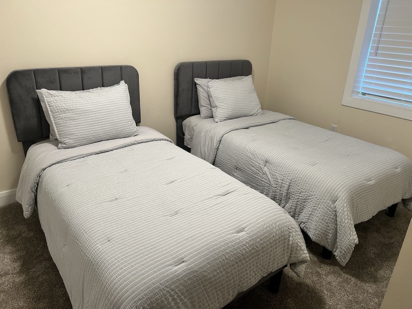 Located in BEAR LAKE/GARDEN CITY 2 Darling Twin Beds