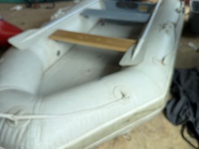 Used Inflatable Dinghy Boat with Oars and Wood Seat