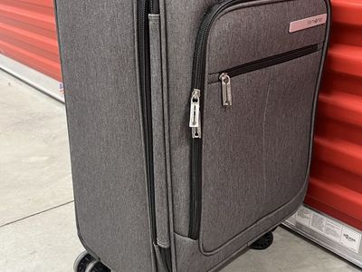 Samsonite carry on suit case