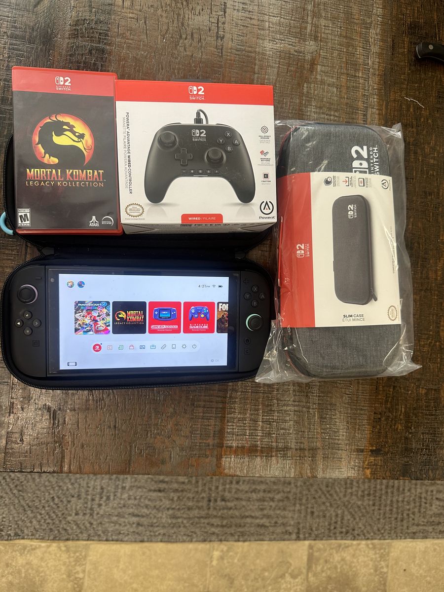 Nintendo Switch 2 w/ 2 games & accessories $450