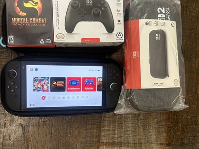 Nintendo Switch 2 w/ 2 games & accessories $450