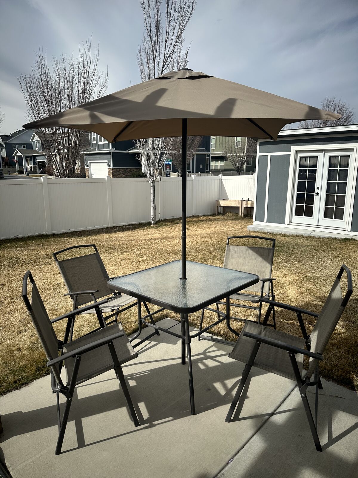Patio Table, Chairs And Umbrella