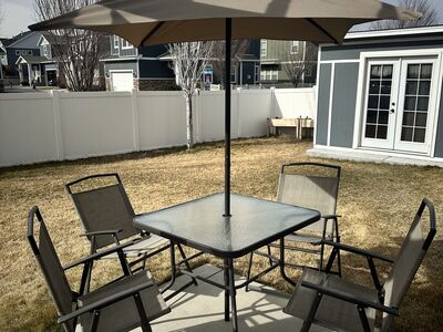 Patio Table, Chairs And Umbrella