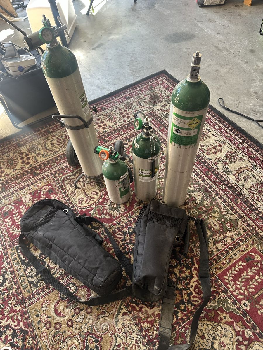 Medical Oxygen Tanks Lot with Regulators, Rolling Cart & Carrying Bags