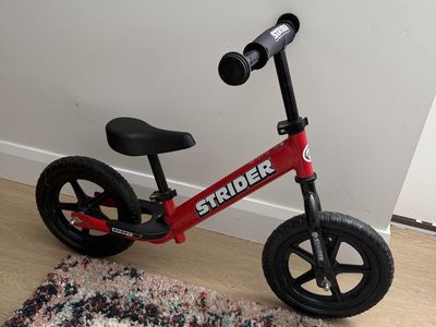 Very Clean Red Strider Balance Bike 12”