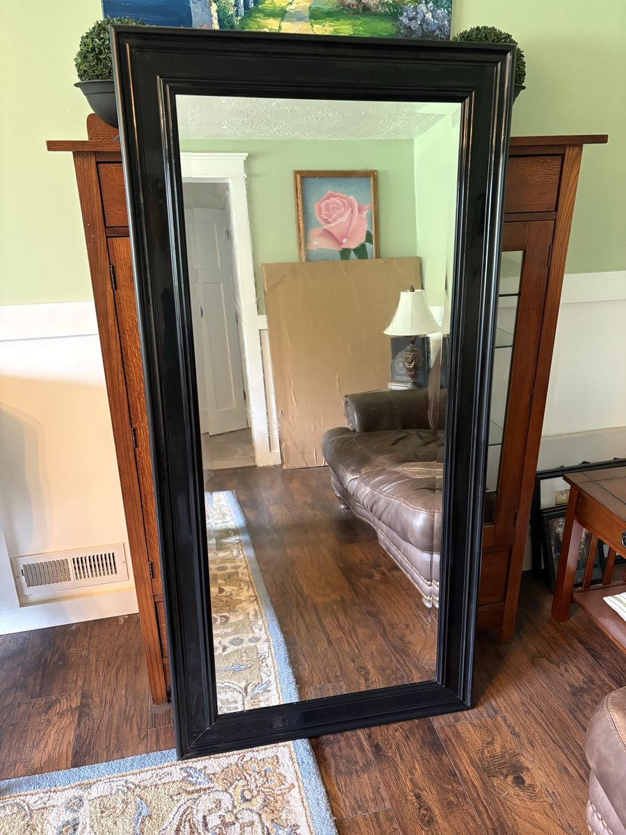 Tall mirror with black frame