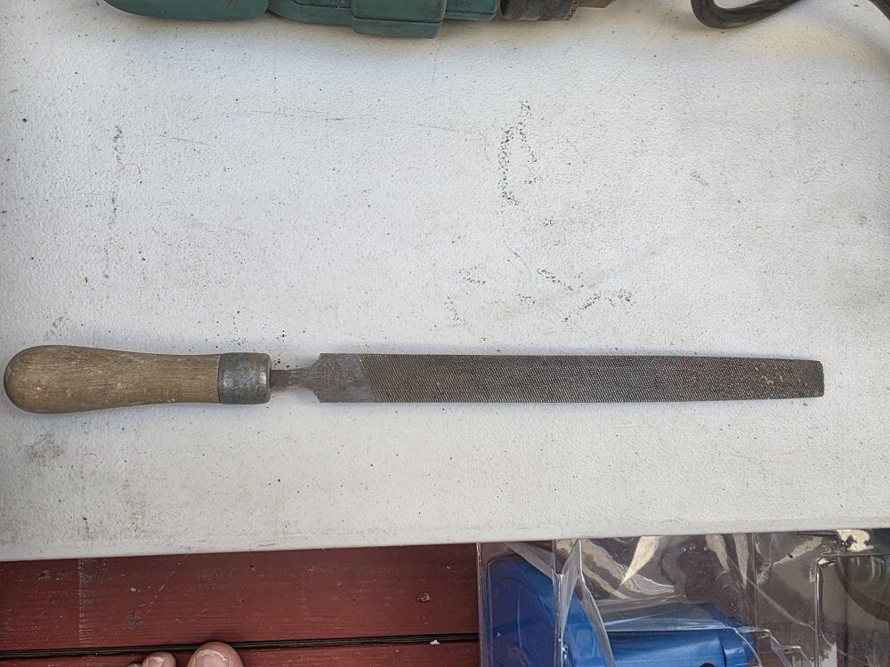 Rasp with wood handle