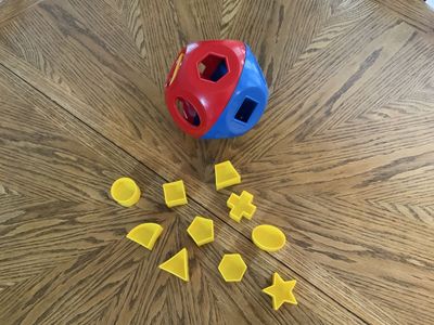 Red, Blue & Yellow Tupperware Shape-O Toy