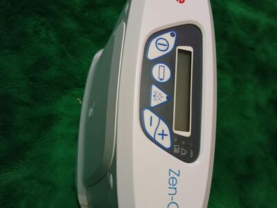 Portable oxygen tank.