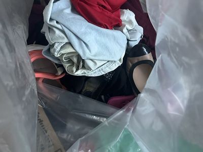 Bag of womens clothes and shoes sized L-XXL