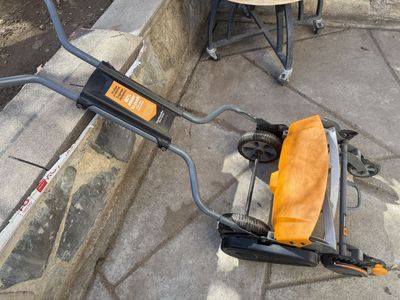 Fiskars push lawn mower.