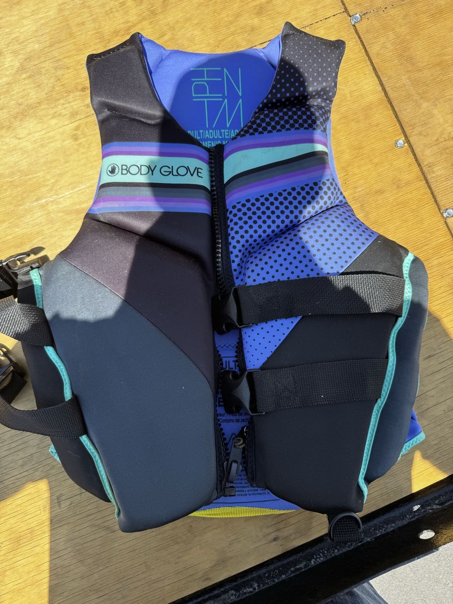 Multiple life vests, different sizes