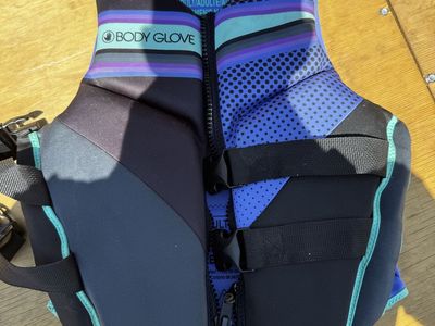 Multiple life vests, different sizes